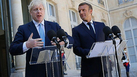 Primer ministro de Reino Unido Boris Johnson y Emmanuel  Macron, presidente de Francia.  